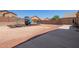 Spacious backyard featuring playground, trampoline and covered patio at 25218 W Carson Ct, Buckeye, AZ 85326