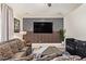 Cozy living room with modern accent wall, stylish decor, and comfortable seating at 25218 W Carson Ct, Buckeye, AZ 85326