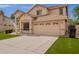 Exterior image showing garage and well maintained lawn of this beautiful single Gathering home at 2602 E Glass Ln, Phoenix, AZ 85042