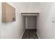 A unique hallway offers convenient storage space and streamlined style at 2602 E Glass Ln, Phoenix, AZ 85042
