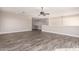 This large living area boasts stylish flooring and a neutral color palette at 2602 E Glass Ln, Phoenix, AZ 85042