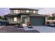 Charming two-story home featuring a modern design, neutral color palette and well-manicured landscaping at 2948 E Mecklenburg Way, San Tan Valley, AZ 85143