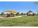 Community park featuring playground equipment, covered picnic areas, and well-maintained green spaces at 2948 E Mecklenburg Way, San Tan Valley, AZ 85143