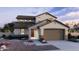 Charming two-story home features a tile roof, neutral stucco exterior, and a two-car garage at 2968 E Mecklenburg Way, San Tan Valley, AZ 85143