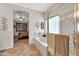 Bright bathroom boasts a soaking tub, glass shower enclosure, and neutral tones at 3214 N 138Th Dr, Avondale, AZ 85392