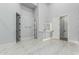 Spacious bathroom with dual vanities, and multiple doorways to enhance livability at 3653 E Runaway Bay Pl, Queen Creek, AZ 85142