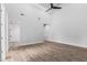 Large bedroom with light walls and wood-look floors at 3653 E Runaway Bay Pl, Queen Creek, AZ 85142