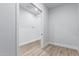 Interior closet with wood floors and white walls at 3653 E Runaway Bay Pl, Queen Creek, AZ 85142
