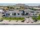 Modern home boasts clean lines, professional landscaping and a welcoming front entrance at 3653 E Runaway Bay Pl, Queen Creek, AZ 85142