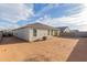 Backyard view of the home with potential space for customization and outdoor enjoyment at 37790 W Santa Clara Ave, Maricopa, AZ 85138