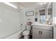 Bright bathroom featuring a tub-shower combo and a stylish vanity with storage at 37790 W Santa Clara Ave, Maricopa, AZ 85138