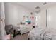 Bedroom with a dresser, a cute mirror, and carpeted floors at 37790 W Santa Clara Ave, Maricopa, AZ 85138