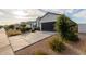 Lovely single-story home with a long driveway and desert landscaping at 37790 W Santa Clara Ave, Maricopa, AZ 85138