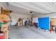 Spacious garage with ping pong table and room for parking and storage at 37790 W Santa Clara Ave, Maricopa, AZ 85138