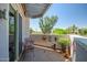 A cozy balcony features charming decor and a scenic view, perfect for relaxing outdoors at 3801 N Goldwater Blvd # 201, Scottsdale, AZ 85251