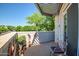 A well-decorated balcony offers a delightful outdoor retreat with artistic accents and seating at 3801 N Goldwater Blvd # 201, Scottsdale, AZ 85251