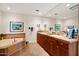 Bathroom boasting double vanities, a large mirror, and a corner tub at 3801 N Goldwater Blvd # 201, Scottsdale, AZ 85251