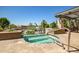 Rooftop hot tub area with lounge seating and clear city views surrounded by lush foliage at 3801 N Goldwater Blvd # 201, Scottsdale, AZ 85251