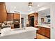 Spacious kitchen features a central island, custom cabinetry, stainless steel appliances, and generous countertop space at 3801 N Goldwater Blvd # 201, Scottsdale, AZ 85251