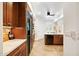 Well-equipped kitchen with stainless steel appliances and custom wood cabinetry at 3801 N Goldwater Blvd # 201, Scottsdale, AZ 85251