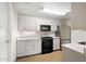 Functional kitchen with stainless steel refrigerator and black oven at 3801 N Goldwater Blvd # 201, Scottsdale, AZ 85251