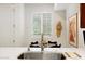 Modern kitchen sink with a stainless steel faucet and ample counter space at 3801 N Goldwater Blvd # 201, Scottsdale, AZ 85251