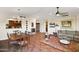 Open floorplan showcasing the living room, dining area, and kitchen with tile flooring at 3801 N Goldwater Blvd # 201, Scottsdale, AZ 85251