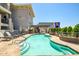 Resort-style community pool and lounge chairs for relaxing by the water at 3801 N Goldwater Blvd # 201, Scottsdale, AZ 85251