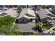 Aerial view of a backyard with gravel landscaping and a block wall fence, offering a clear view of the outdoor space and layout at 41839 W Avella Dr, Maricopa, AZ 85138