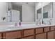 Bathroom with dual sinks, vanity, and ample counter space at 4216 W Harwell Rd, Laveen, AZ 85339