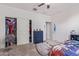 Bedroom with closet, dresser, carpet, and ample natural light at 4216 W Harwell Rd, Laveen, AZ 85339