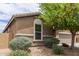 Charming single-Gathering home with a desert landscape and a side view at 4216 W Harwell Rd, Laveen, AZ 85339