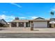 Charming single-story home featuring a neutral color palette, brick accents, and a well-maintained yard at 4720 W Northview Ave, Glendale, AZ 85301