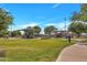 Community playground with shaded structures and green spaces for recreational activities at 4720 W Northview Ave, Glendale, AZ 85301