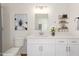 Clean, modern bathroom with white vanity, quartz countertop, and stylish decor at 5055 N Jayson Rd, Casa Grande, AZ 85194