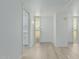 Hallway with sleek doors and entry to the kitchen at 6051 E Ensenada St, Mesa, AZ 85205