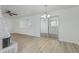 Open-concept living area with fireplace and sliding glass doors to patio, perfect for entertaining at 6051 E Ensenada St, Mesa, AZ 85205