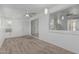 Cozy living room featuring neutral carpet, and a ceiling fan providing comfort at 6051 E Ensenada St, Mesa, AZ 85205