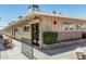 Well-maintained office building exterior with clean lines and a welcoming entrance at 6051 E Ensenada St, Mesa, AZ 85205