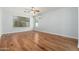 Spacious bedroom with natural light and hardwood floors at 6180 W Oraibi Dr, Glendale, AZ 85308