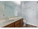 Bathroom vanity with ample countertop space and storage, paired with a large mirror and modern fixtures at 747 S Extension Rd # 113, Mesa, AZ 85210