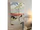 Wall art showcasing palm trees and desert scene with decorative vase at 7625 E Camelback Rd # B241, Scottsdale, AZ 85251