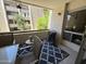 Cozy patio area with outdoor furniture and stylish decor and outdoor grill at 7625 E Camelback Rd # B241, Scottsdale, AZ 85251