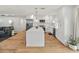 Spacious kitchen with white island, stainless steel appliances, and open floor plan at 7802 E Hubbell St, Scottsdale, AZ 85257