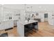 Well-lit kitchen featuring a spacious island and contemporary pendant lighting at 7802 E Hubbell St, Scottsdale, AZ 85257