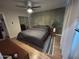 Stylish main bedroom with hardwood floors, modern decor and unique painted wall at 7802 E Hubbell St, Scottsdale, AZ 85257