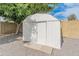 Durable metal shed in a landscaped backyard, perfect for storage at 7802 E Hubbell St, Scottsdale, AZ 85257