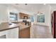 Bright kitchen featuring stainless steel appliances, light wood cabinets, and tile floors at 8009 W Salter Dr, Peoria, AZ 85382