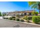 Lovely home featuring a three-car garage, solar panels, and beautifully manicured desert landscaping at 8132 W Hatfield Rd, Peoria, AZ 85383