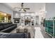 Spacious living room with a modern fireplace, floating shelves, and stylish decor at 8132 W Hatfield Rd, Peoria, AZ 85383